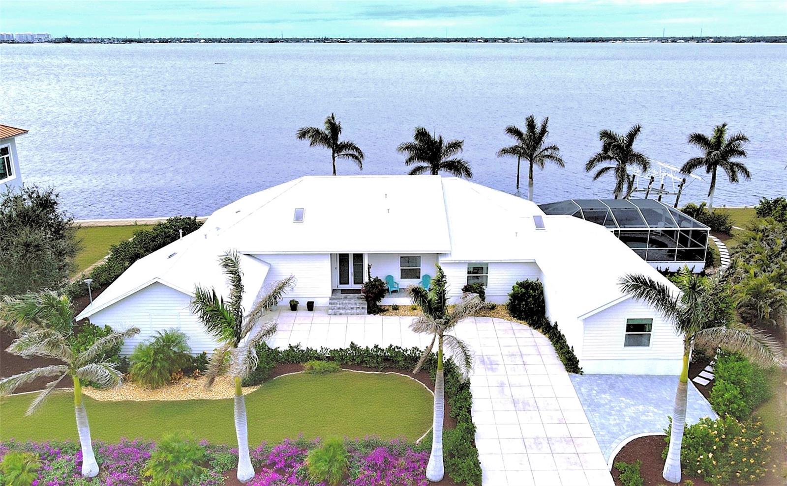 Single Family Residence em PUNTA GORDA, FL - Daniel Dourado