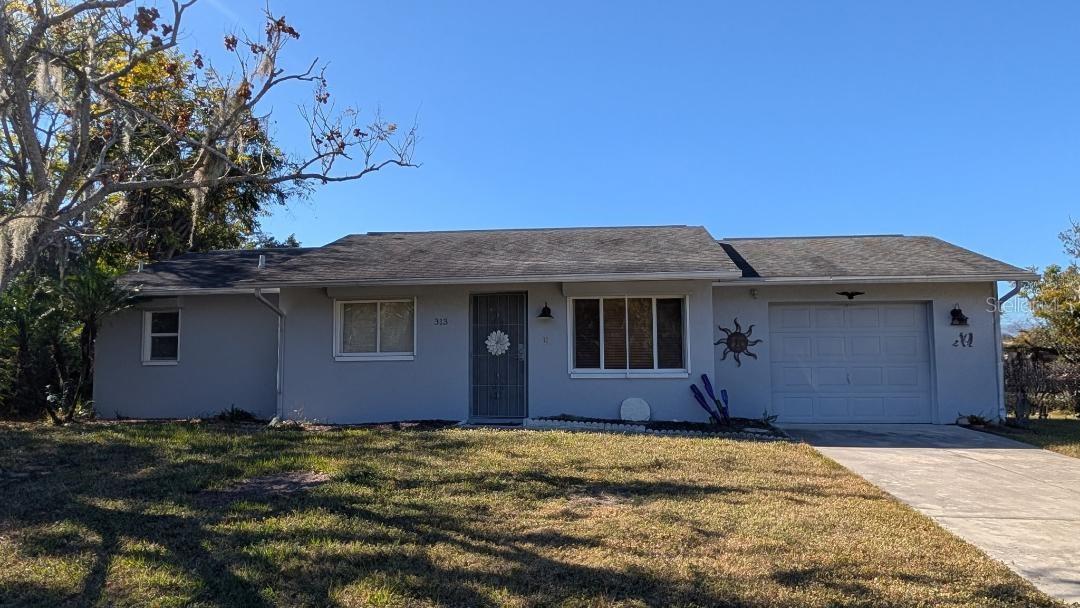 Single Family Residence em PORT CHARLOTTE, FL - Daniel Dourado