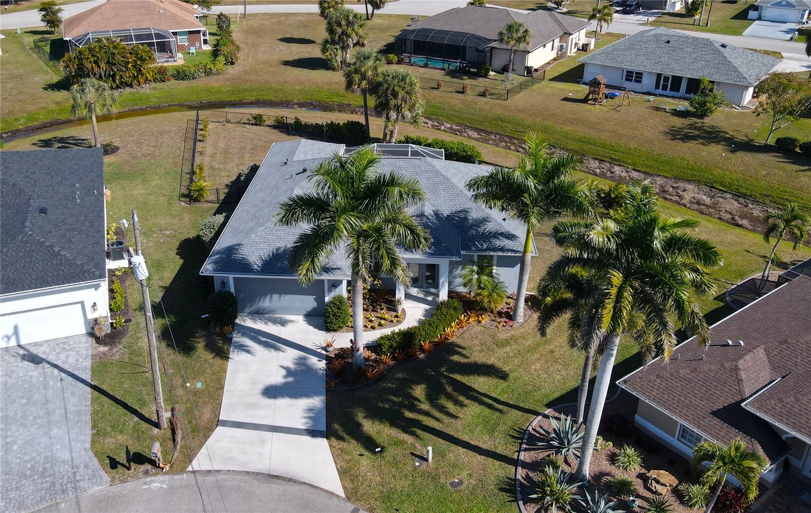 Single Family Residence em PUNTA GORDA, FL - Daniel Dourado