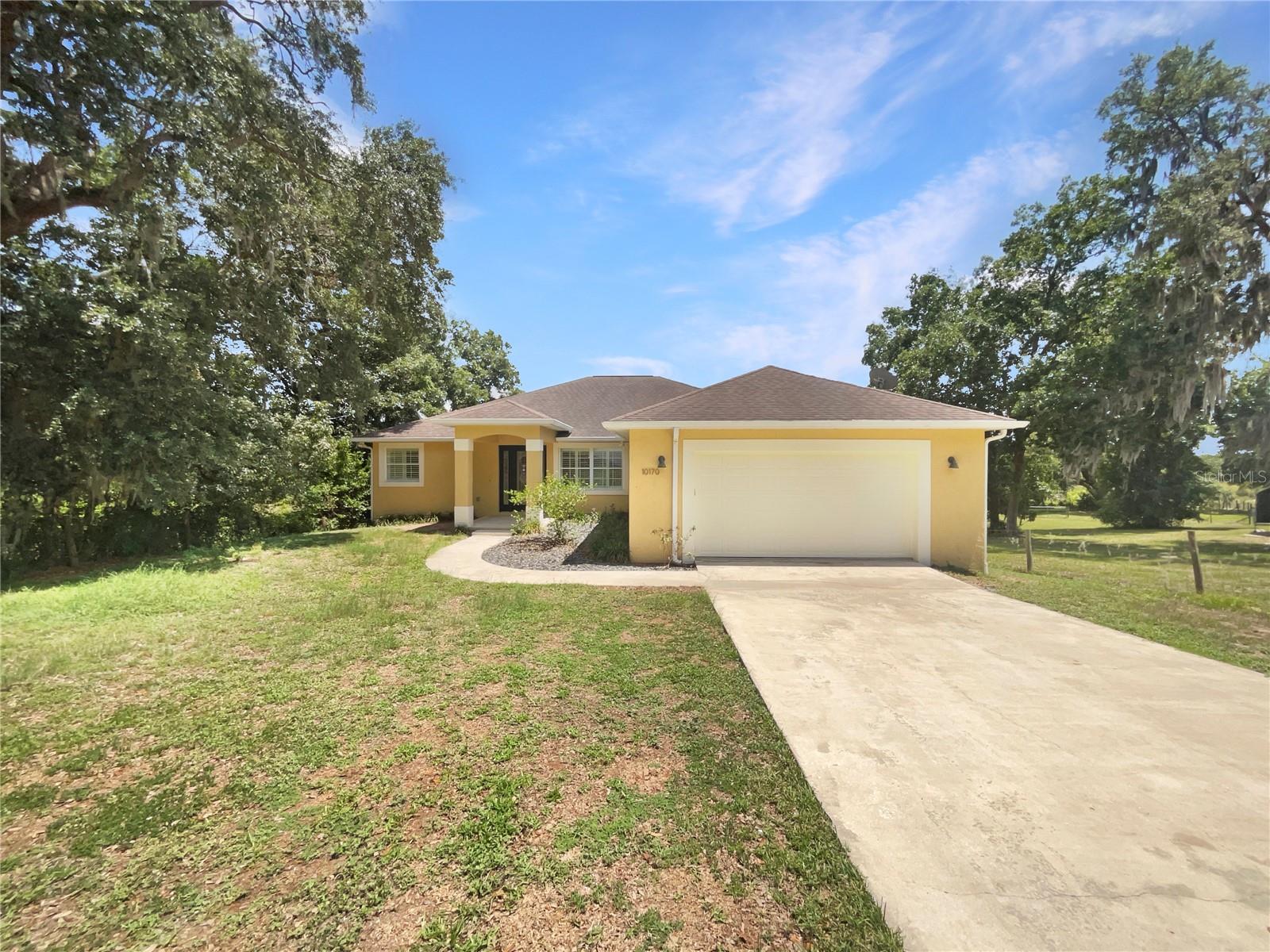 Single Family Residence in BELLEVIEW, FL - Daniel Dourado