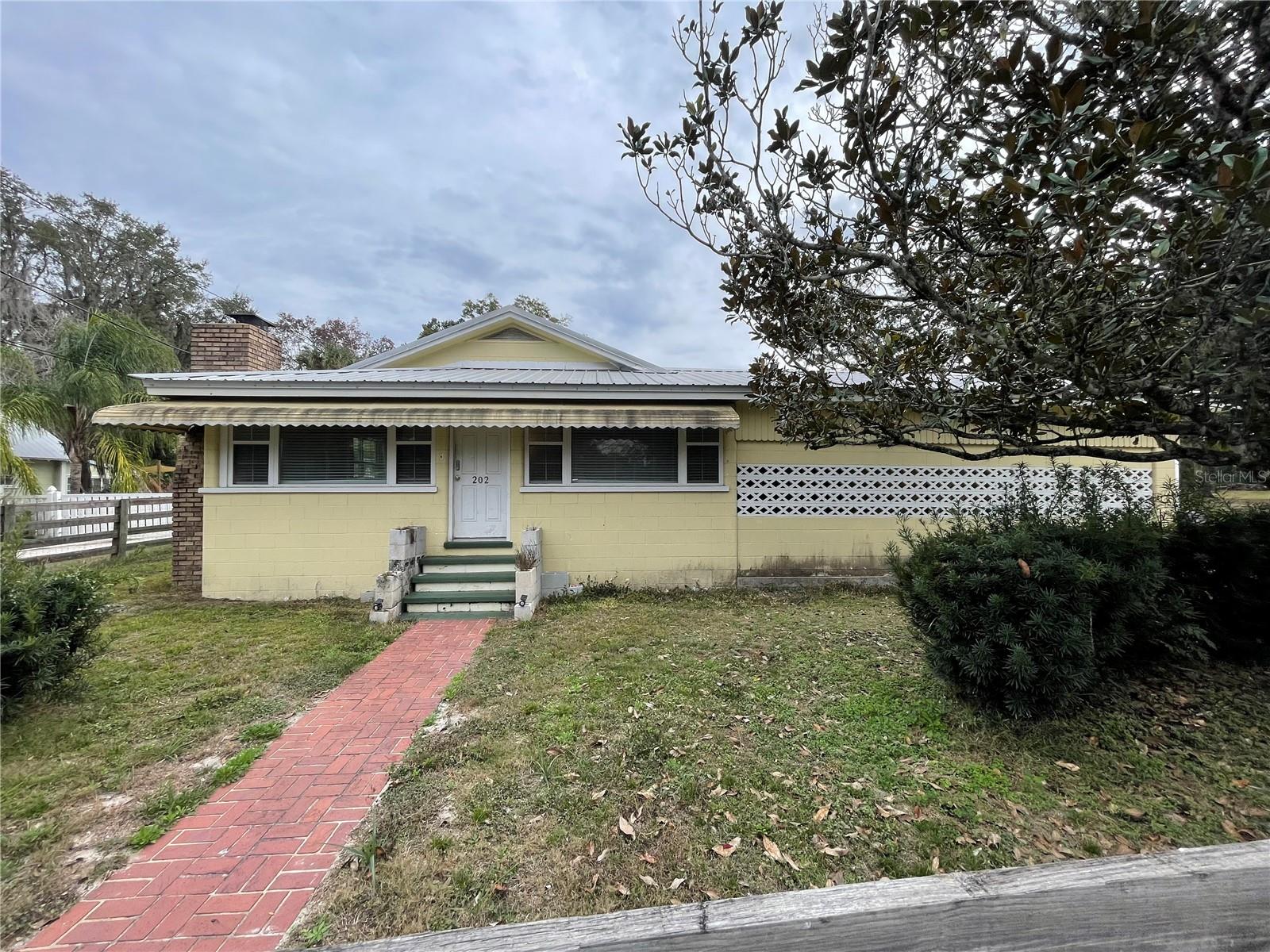 Single Family Residence em WILDWOOD, FL - Daniel Dourado