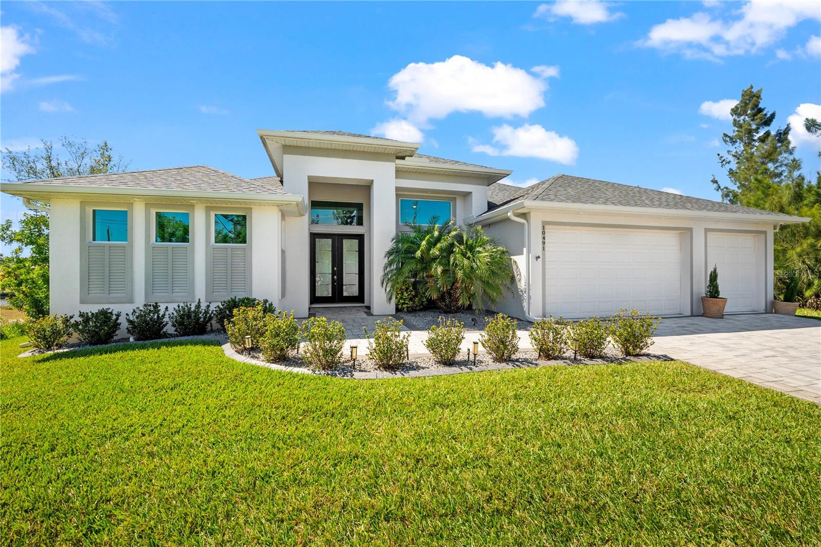 Single Family Residence em PORT CHARLOTTE, FL - Daniel Dourado