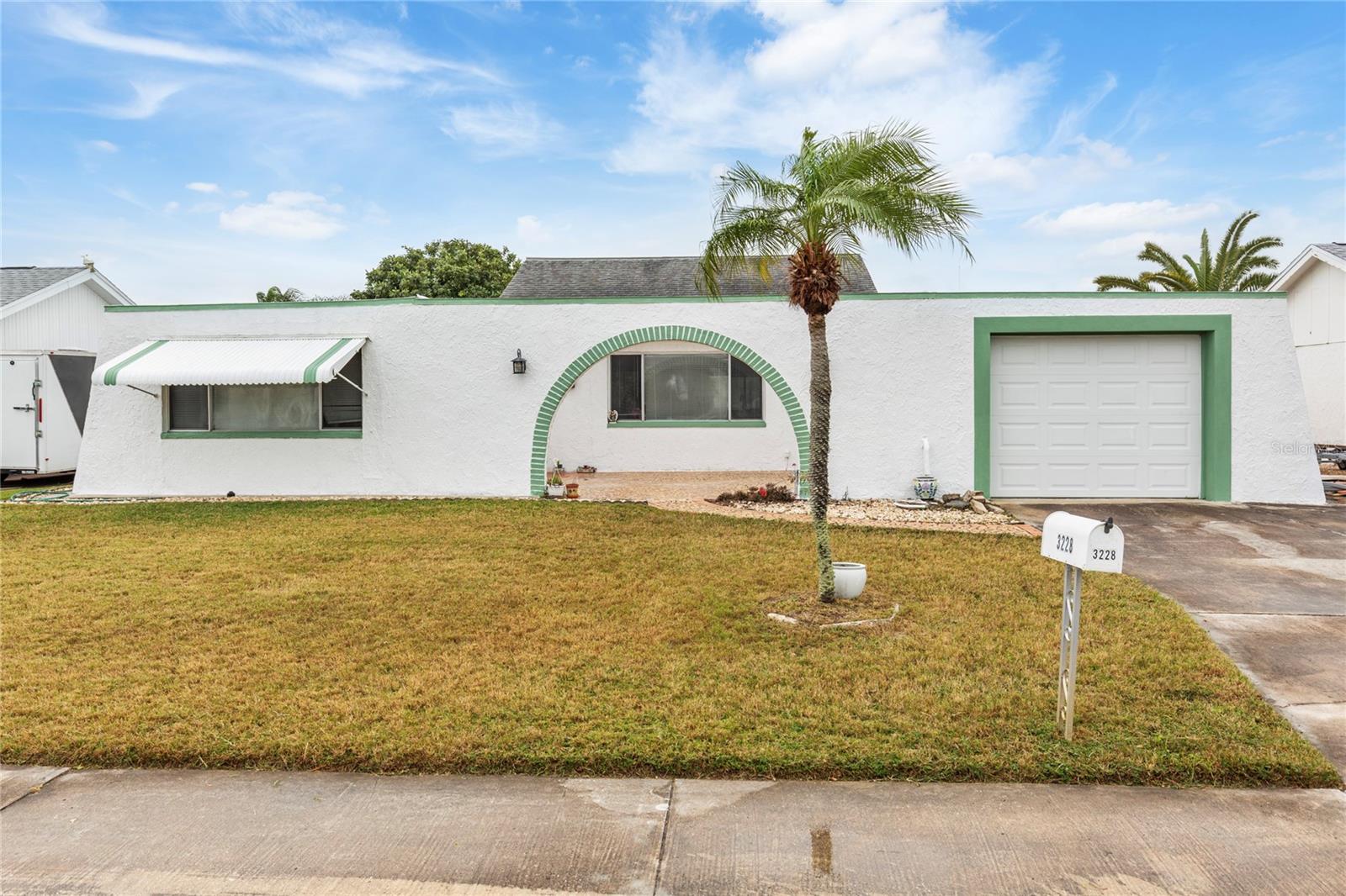 Single Family Residence in HOLIDAY, FL - Daniel Dourado