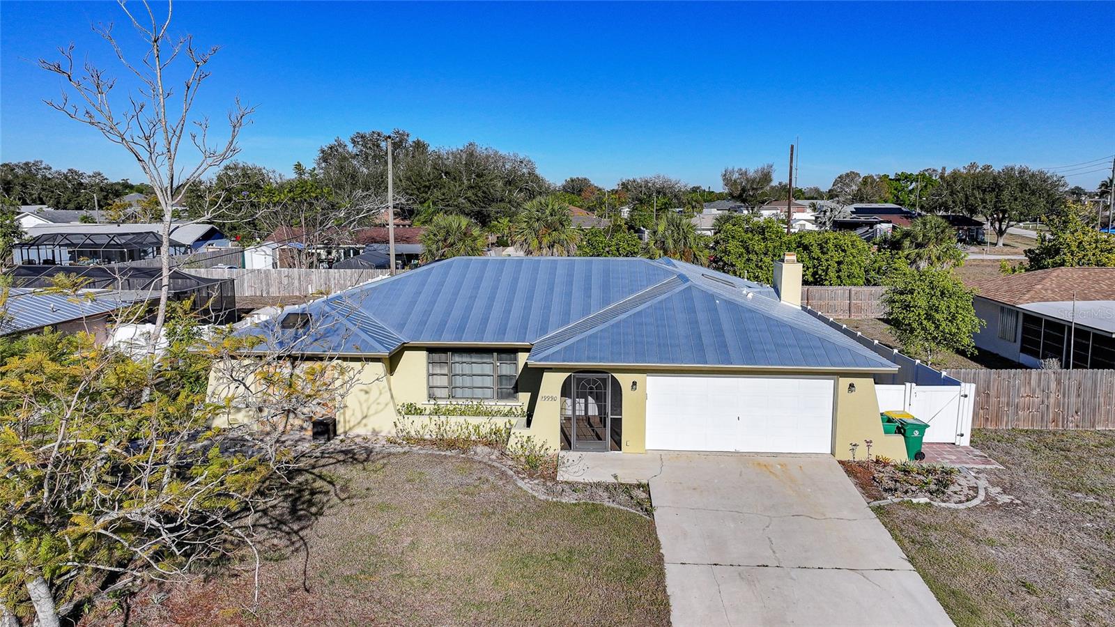 Single Family Residence em PORT CHARLOTTE, FL - Daniel Dourado