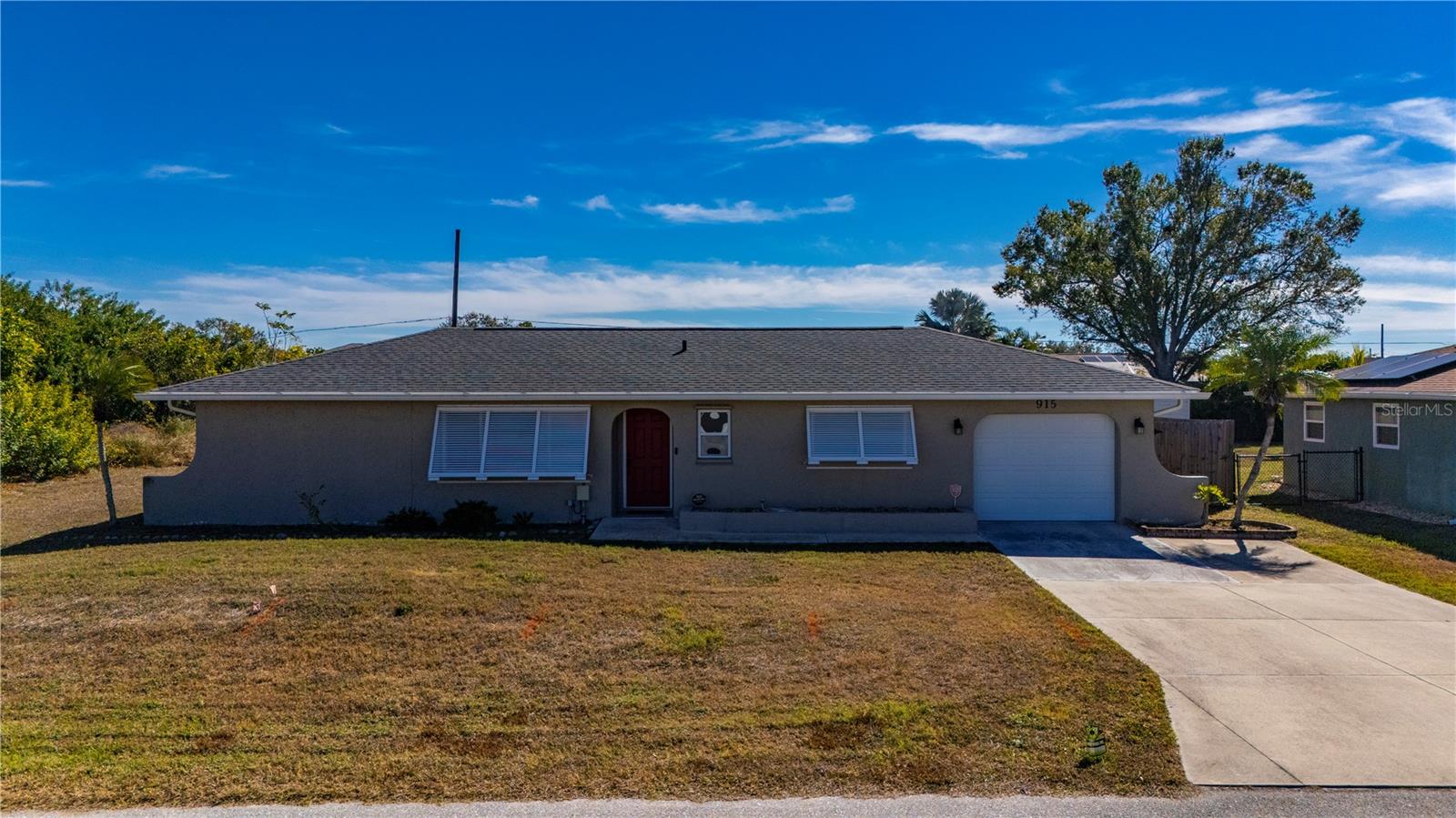 Single Family Residence em PORT CHARLOTTE, FL - Daniel Dourado