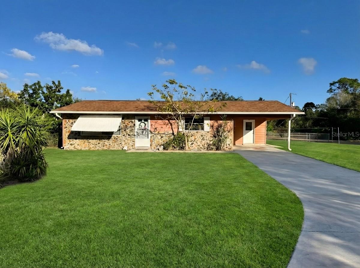 Single Family Residence em PUNTA GORDA, FL - Daniel Dourado
