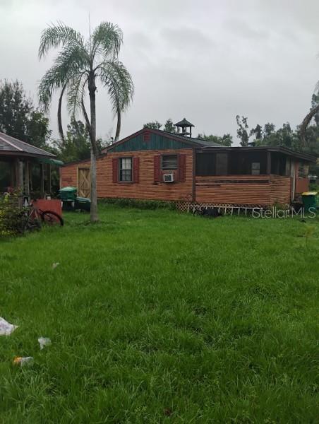 Single Family Residence em PUNTA GORDA, FL - Daniel Dourado