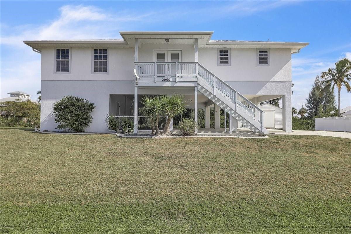 Single Family Residence em PUNTA GORDA, FL - Daniel Dourado