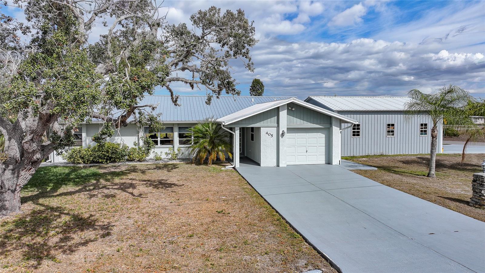 Single Family Residence em PUNTA GORDA, FL - Daniel Dourado