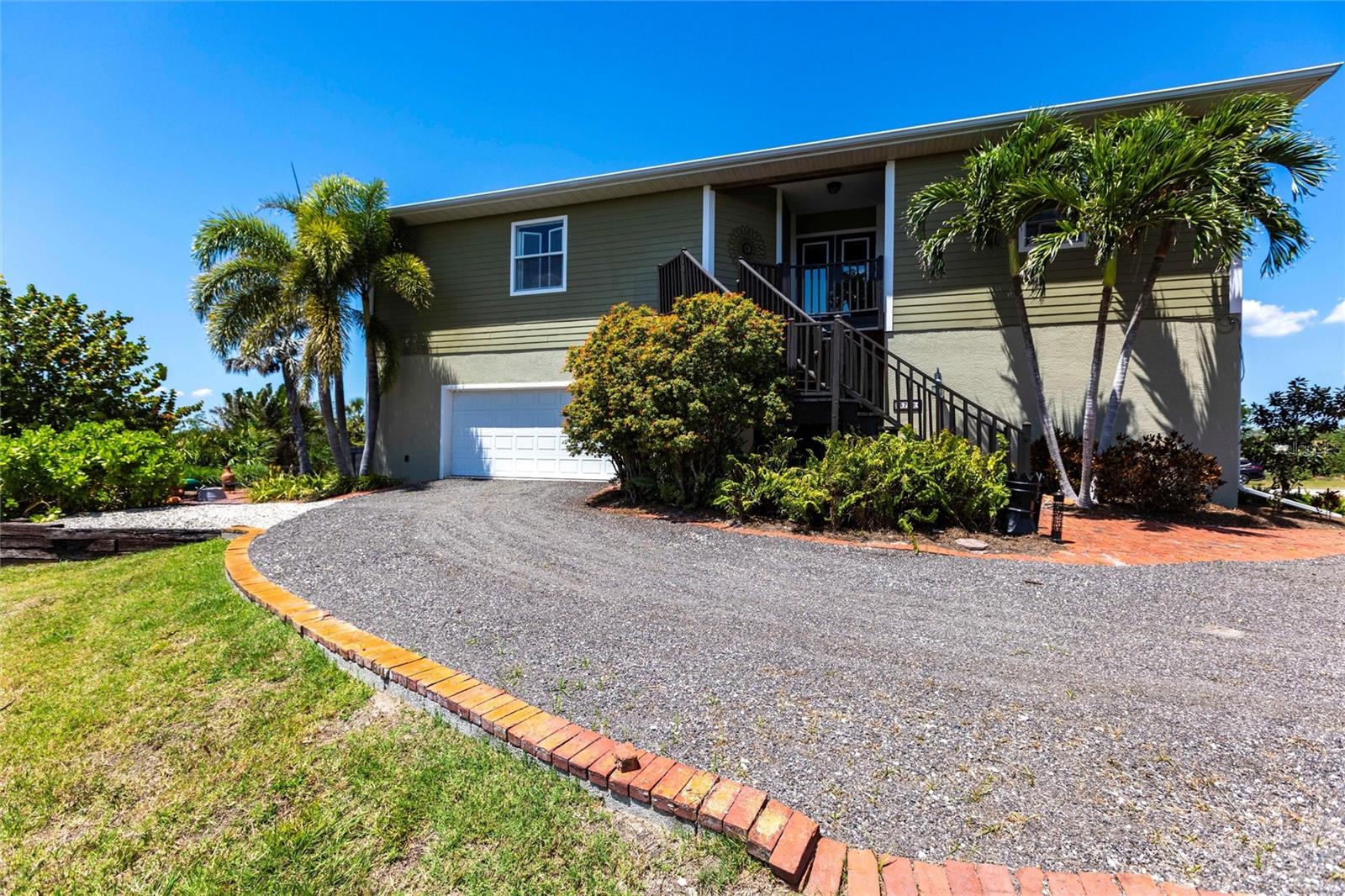 Single Family Residence em PUNTA GORDA, FL - Daniel Dourado