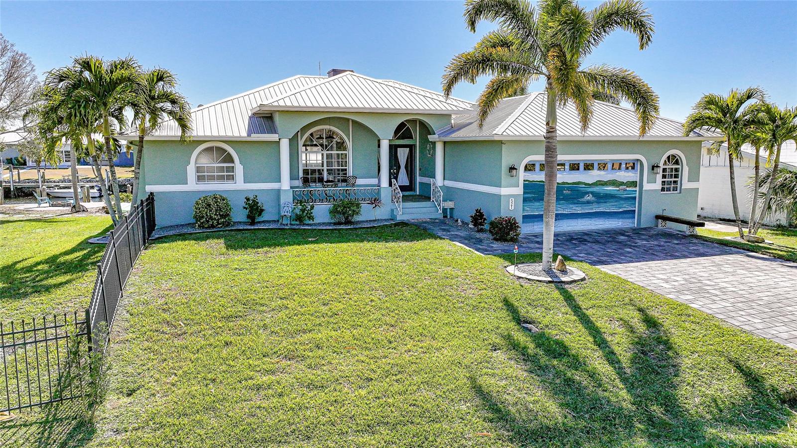 Single Family Residence em PUNTA GORDA, FL - Daniel Dourado