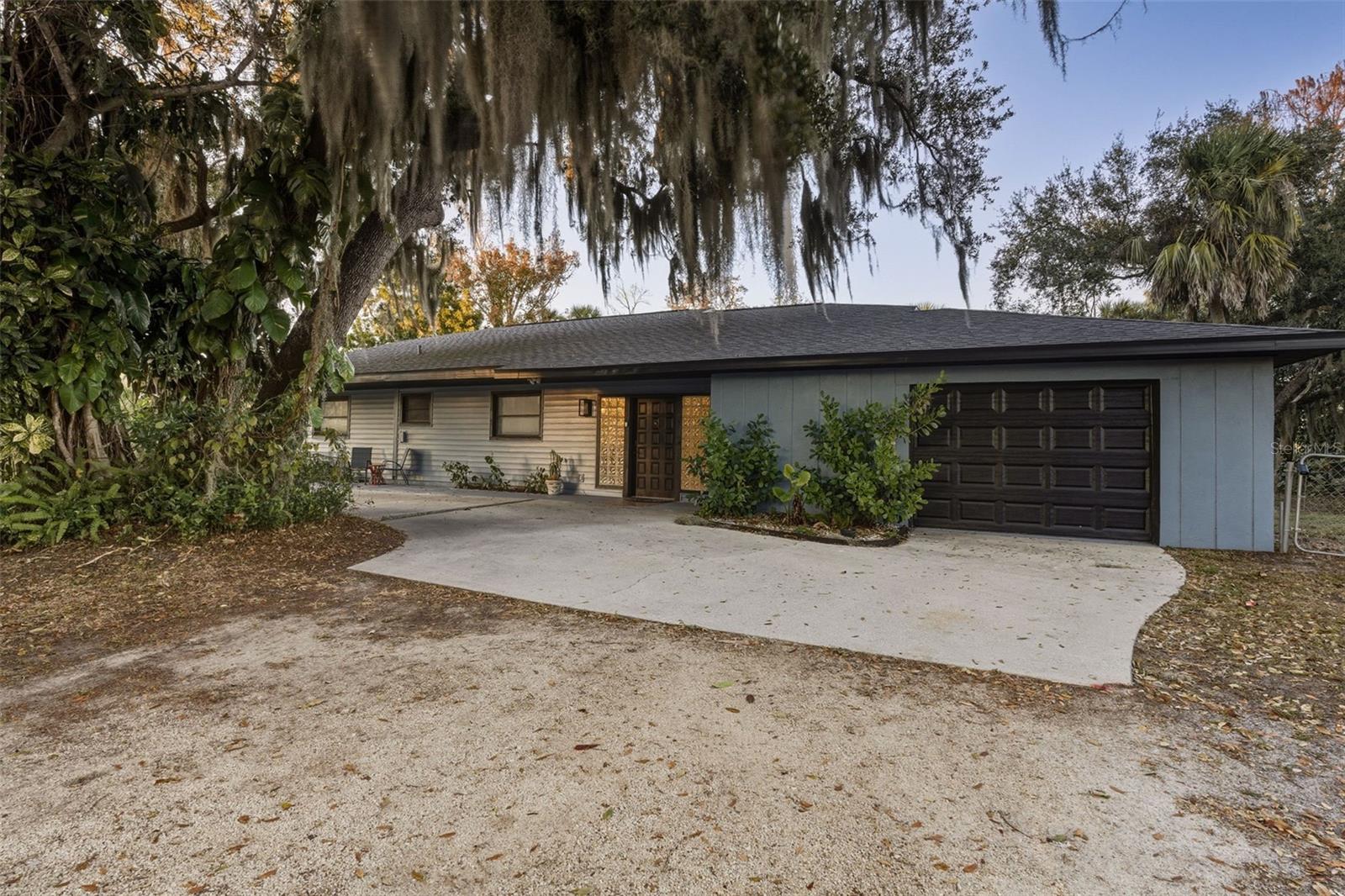 Single Family Residence em PUNTA GORDA, FL - Daniel Dourado