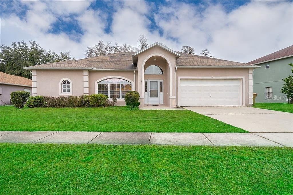 Single Family Residence em KISSIMMEE, FL - Daniel Dourado