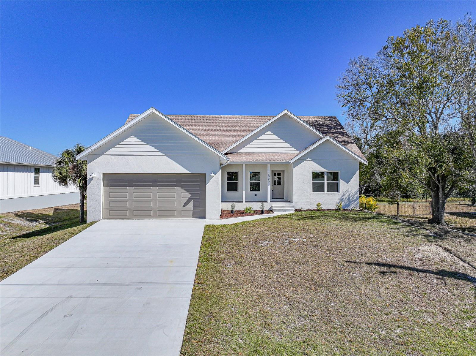 Single Family Residence em PUNTA GORDA, FL - Daniel Dourado