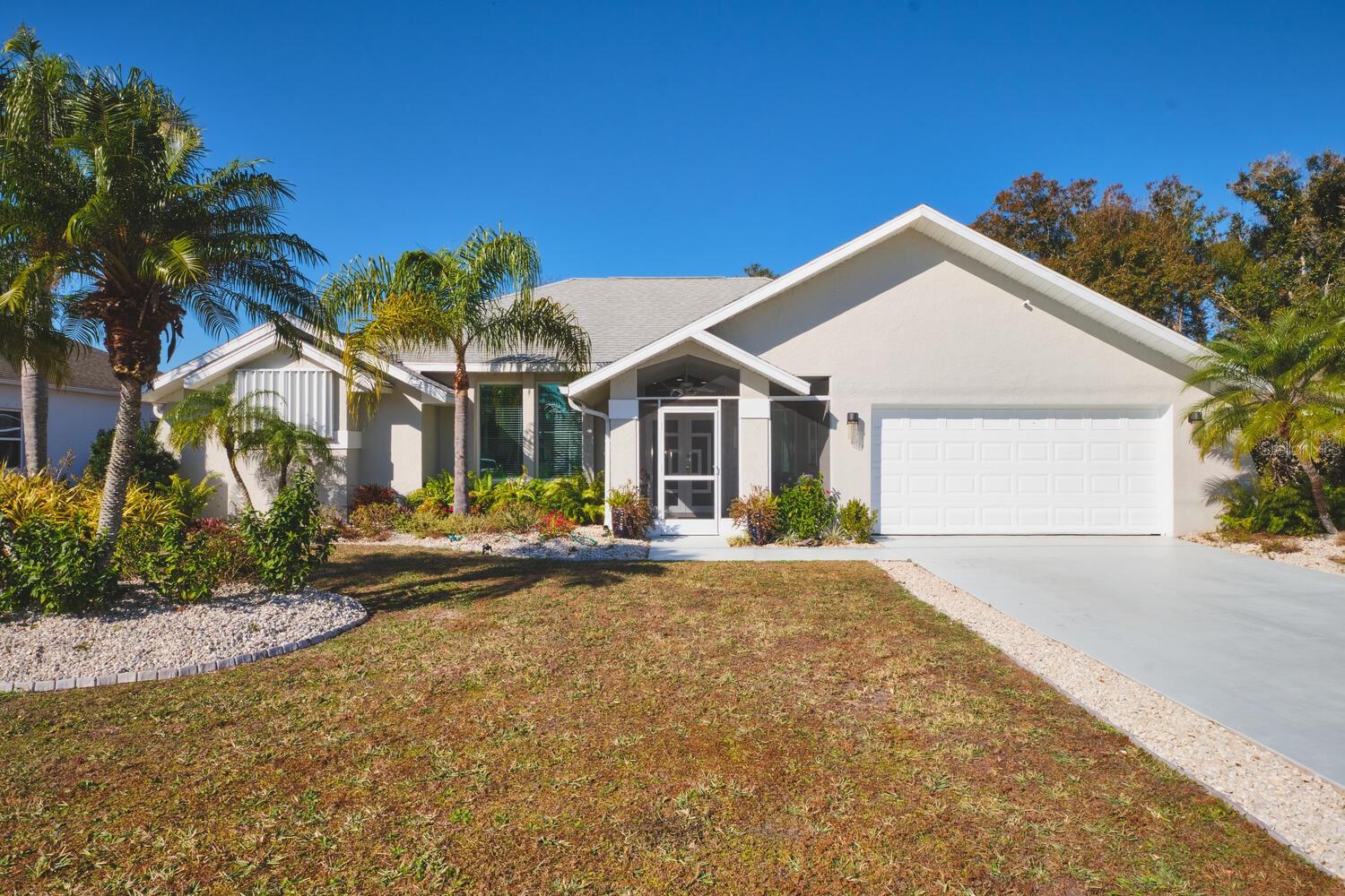 Single Family Residence em PUNTA GORDA, FL - Daniel Dourado