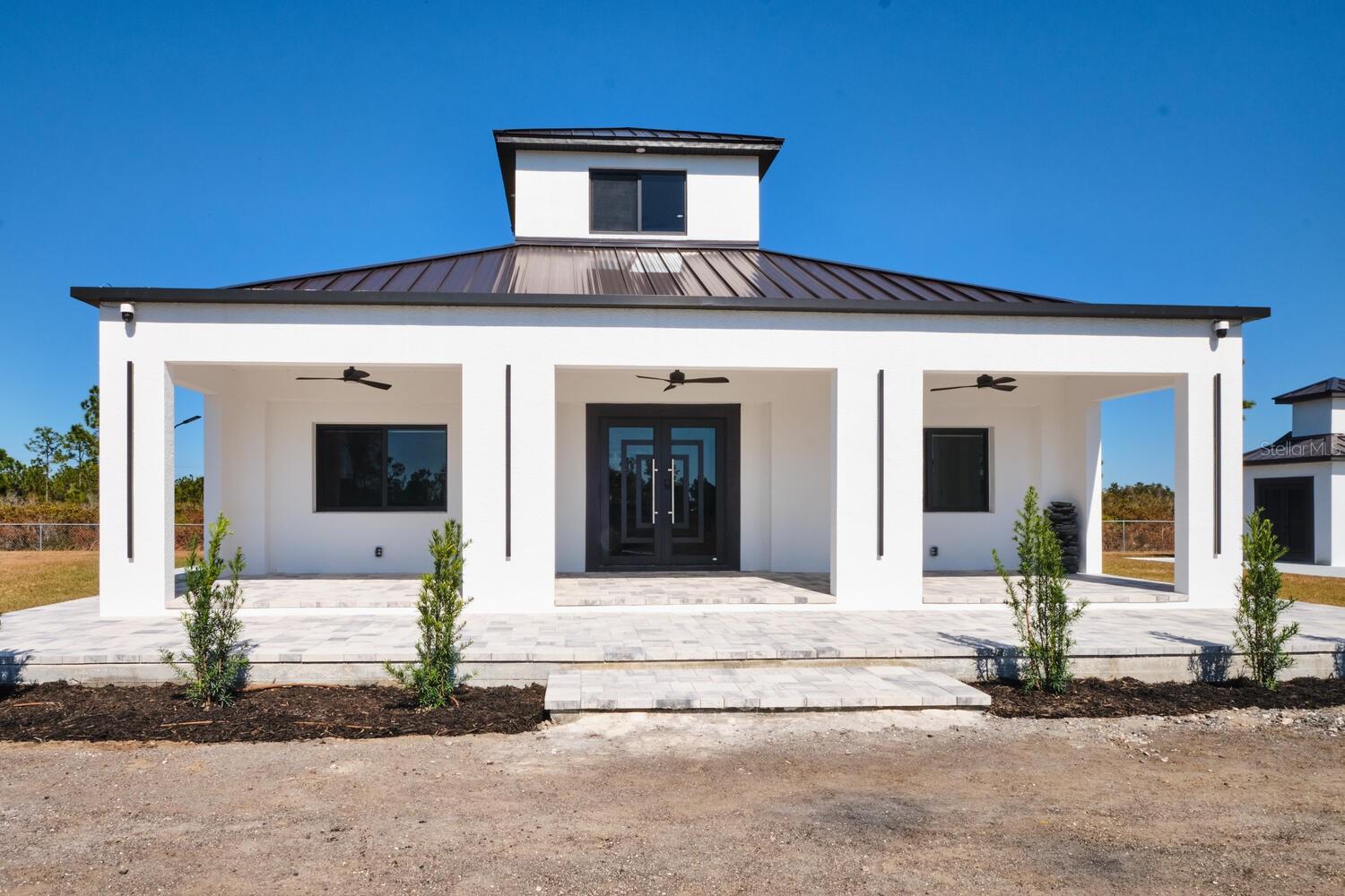 Single Family Residence em PUNTA GORDA, FL - Daniel Dourado