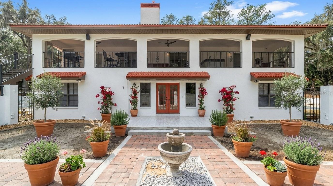 Single Family Residence em MICANOPY, FL - Daniel Dourado