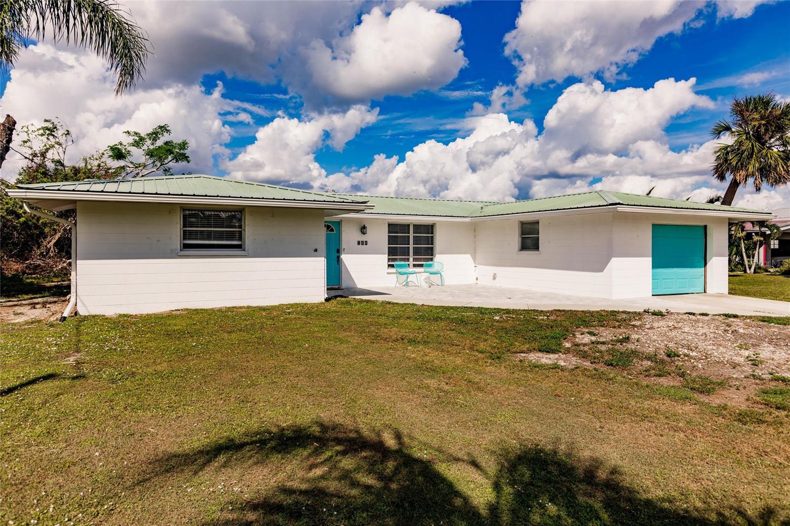 Single Family Residence em PUNTA GORDA, FL - Daniel Dourado