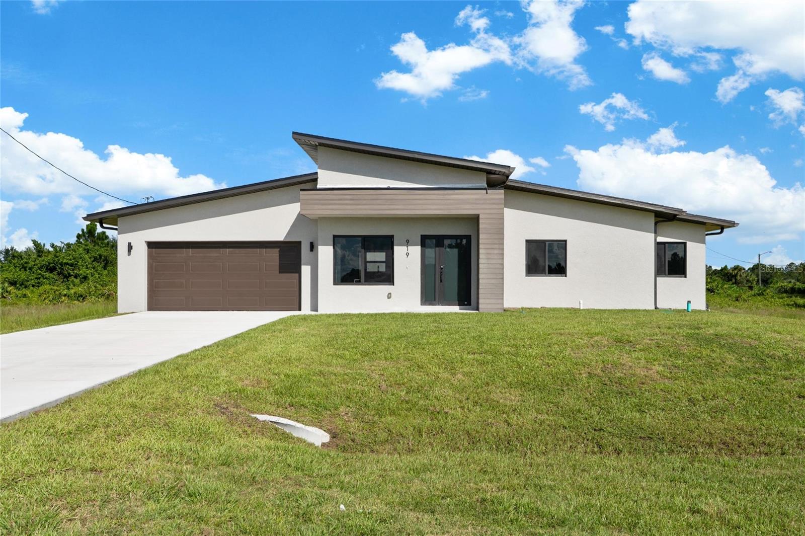 Single Family Residence in LEHIGH ACRES, FL - Daniel Dourado