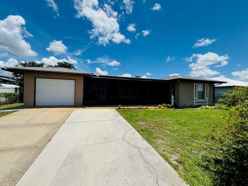 Single Family Residence in PUNTA GORDA, FL - Daniel Dourado