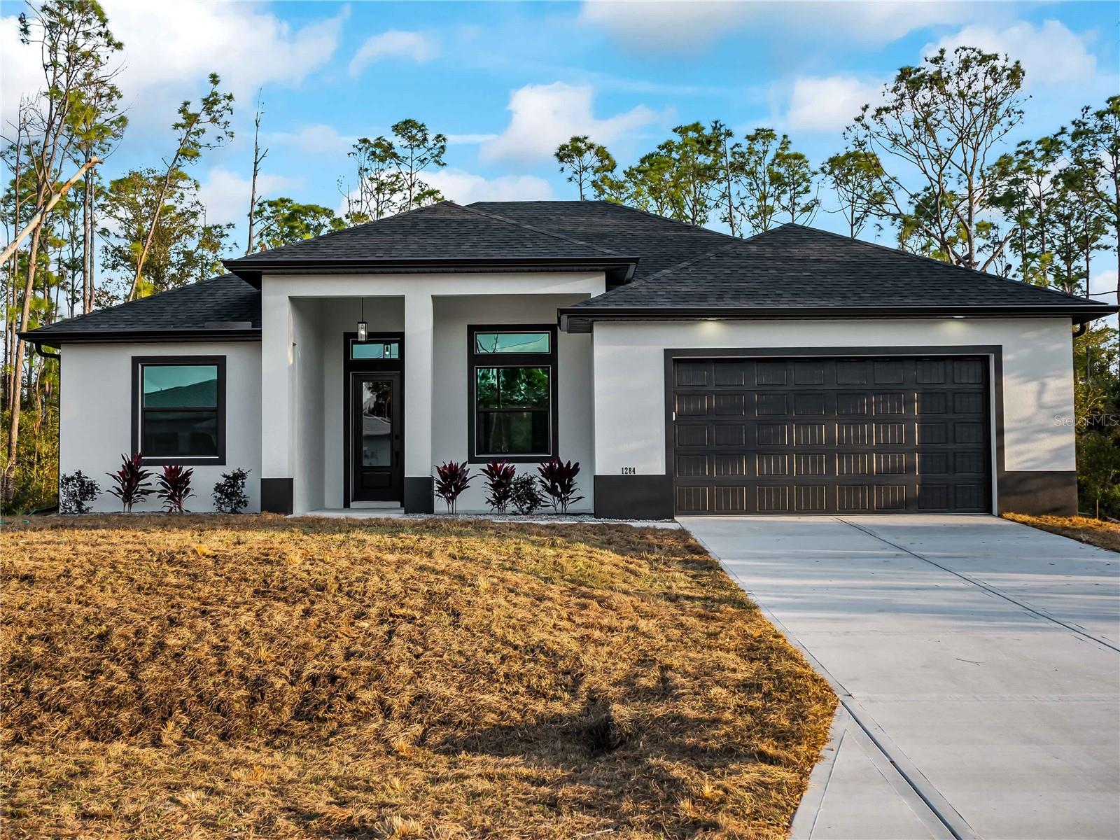 Single Family Residence in PORT CHARLOTTE, FL - Daniel Dourado