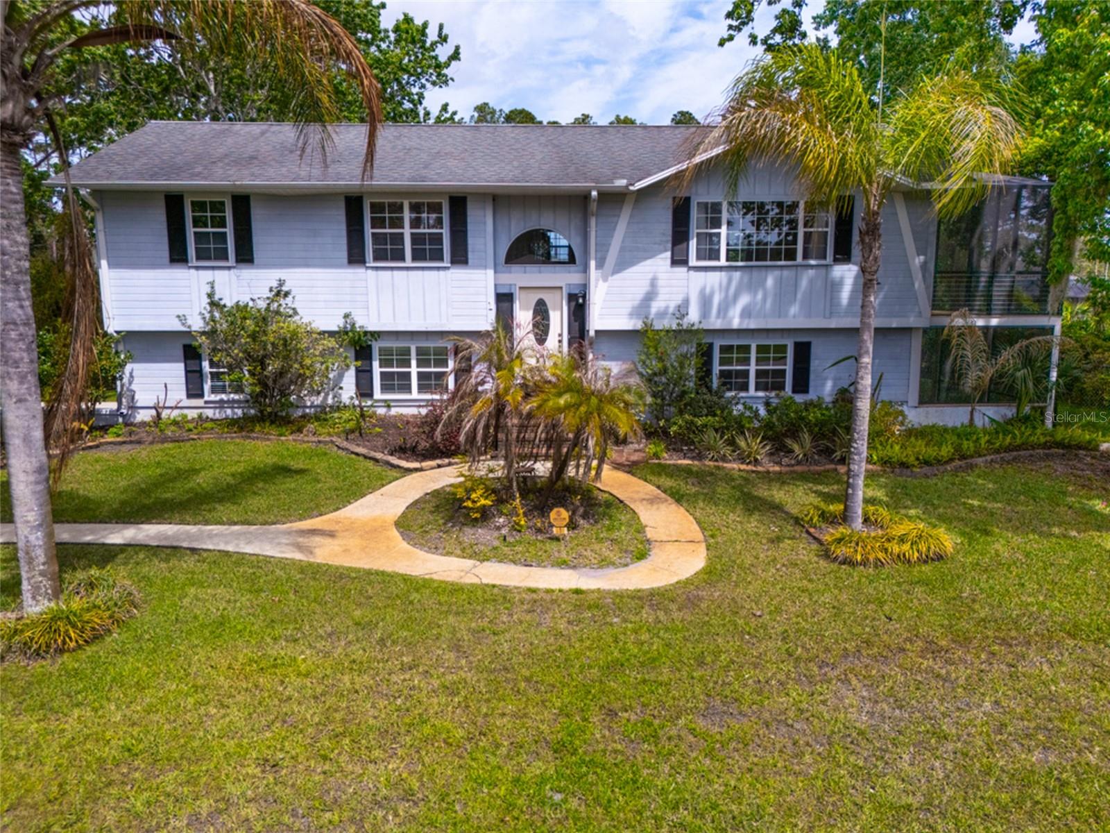 Single Family Residence in PALM COAST, FL - Daniel Dourado