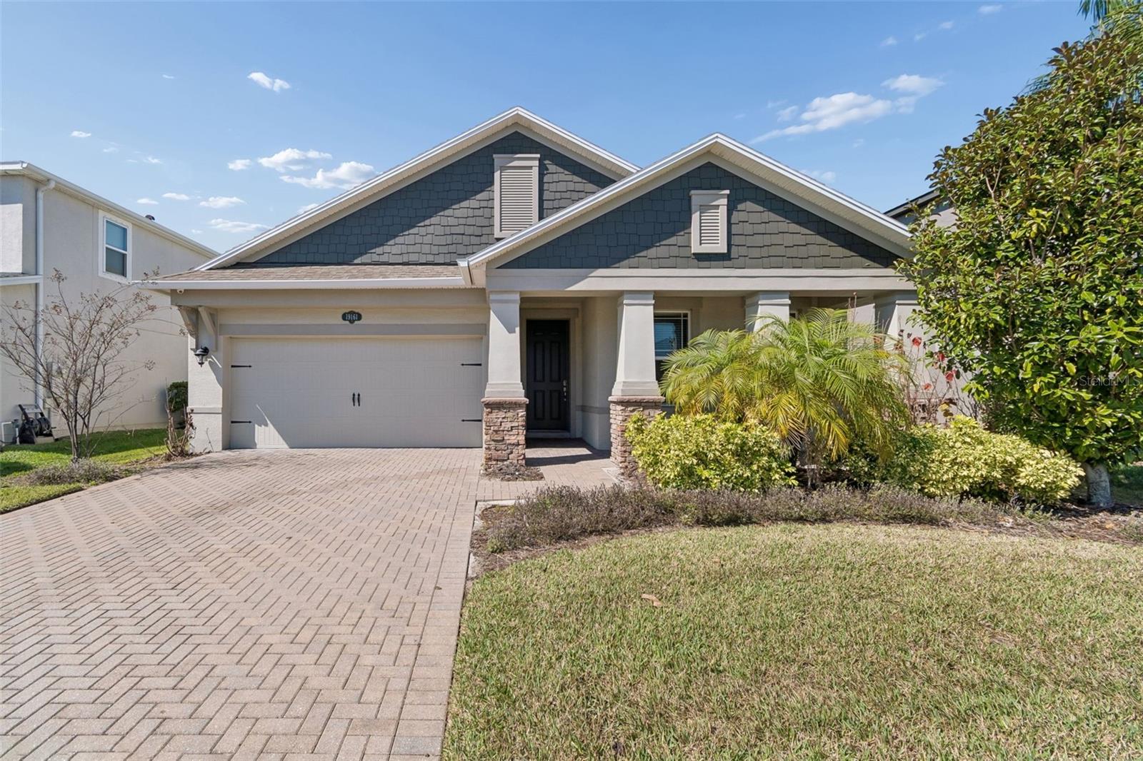 Single Family Residence in LUTZ, FL - Daniel Dourado