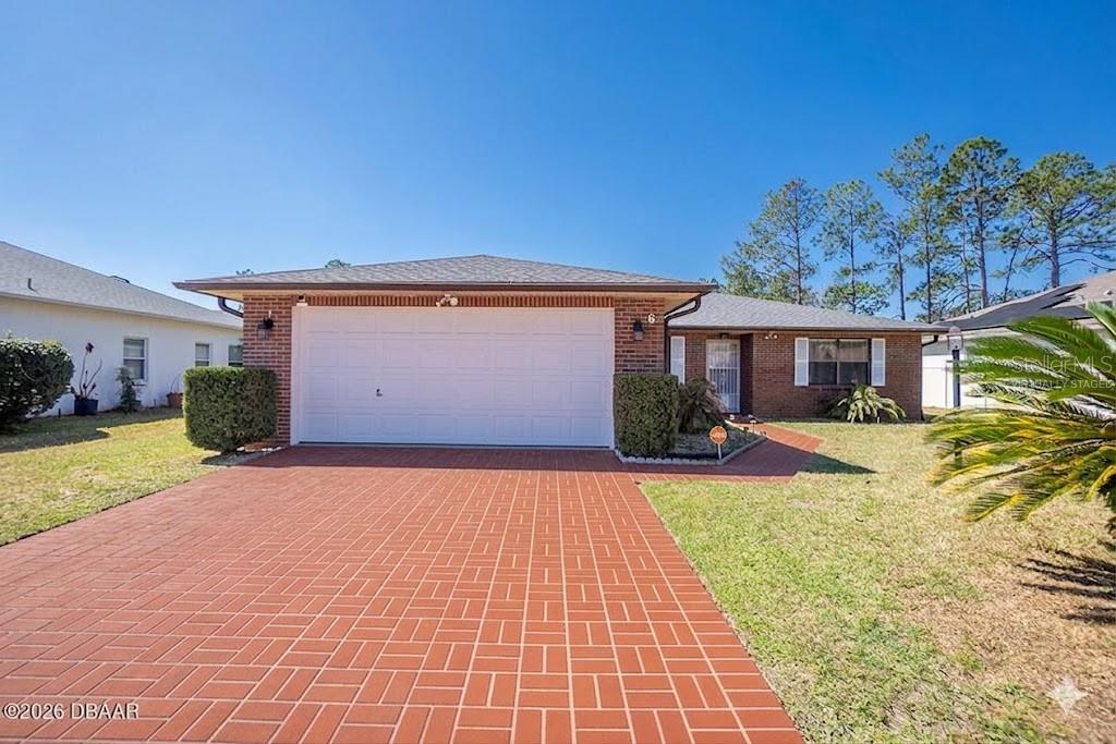 Single Family Residence in PALM COAST, FL - Daniel Dourado