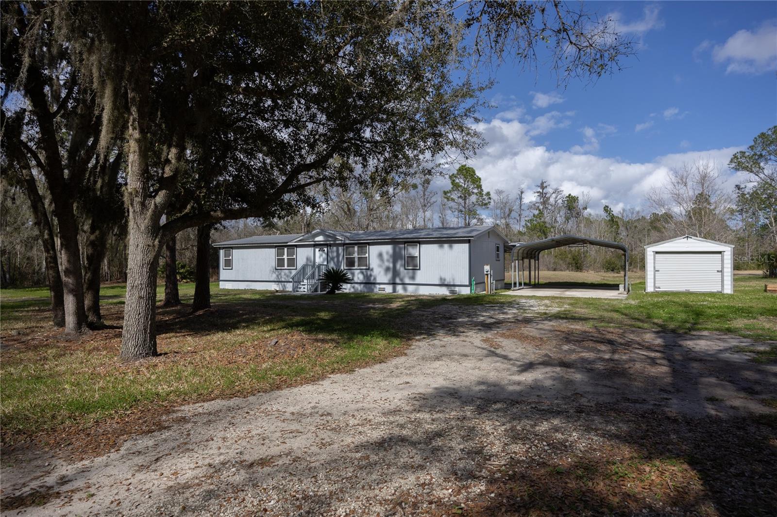 Single Family Residence em PALATKA, FL - Daniel Dourado