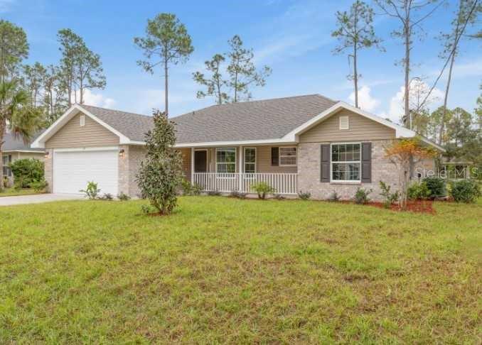 Single Family Residence in PALM COAST, FL - Daniel Dourado