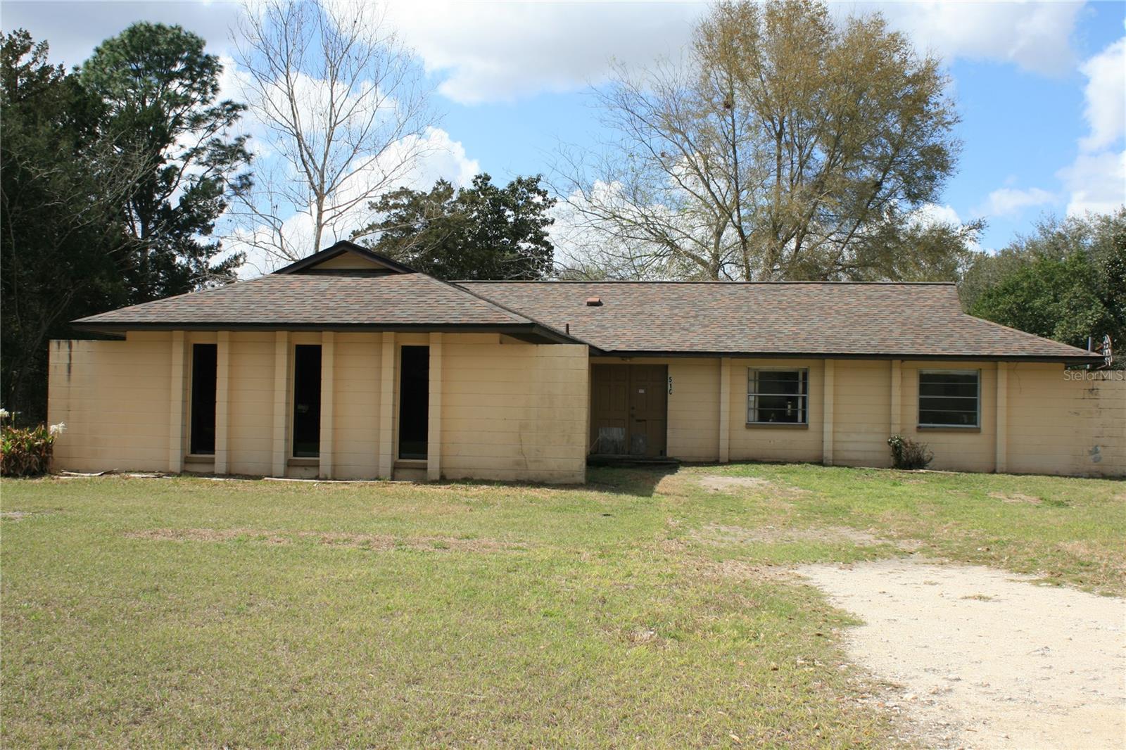 Single Family Residence em NEWBERRY, FL - Daniel Dourado