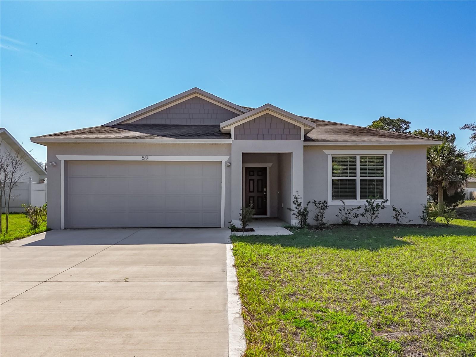Single Family Residence in PALM COAST, FL - Daniel Dourado
