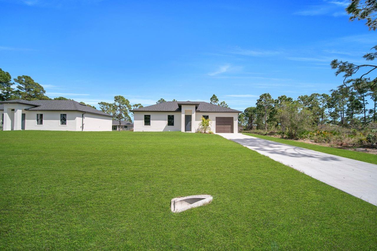 Single Family Residence in LEHIGH ACRES, FL - Daniel Dourado