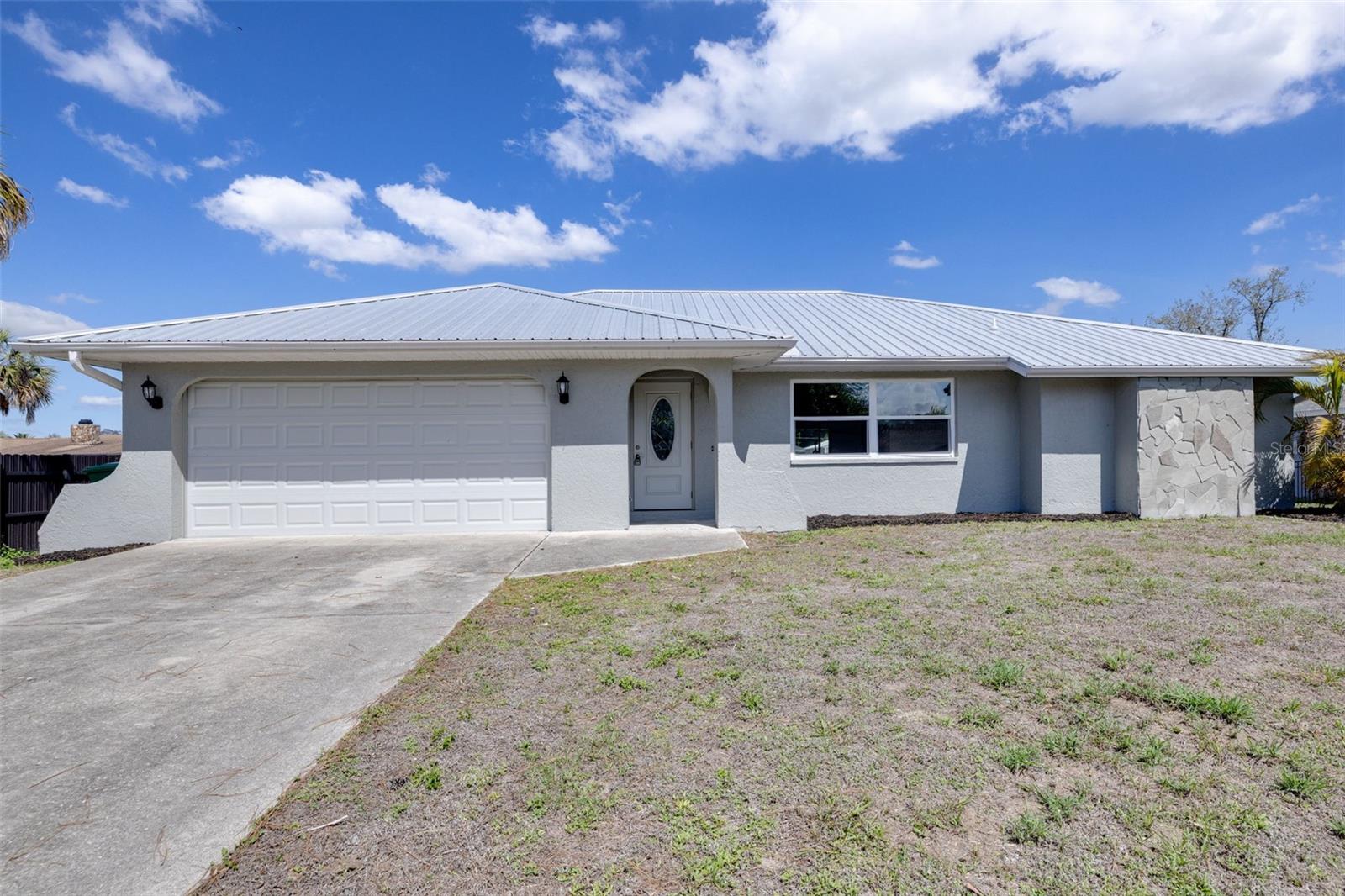 Single Family Residence em PUNTA GORDA, FL - Daniel Dourado