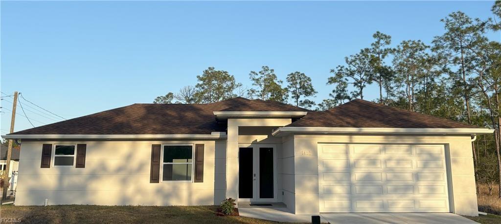 Single Family Residence in LEHIGH ACRES, FL - Daniel Dourado