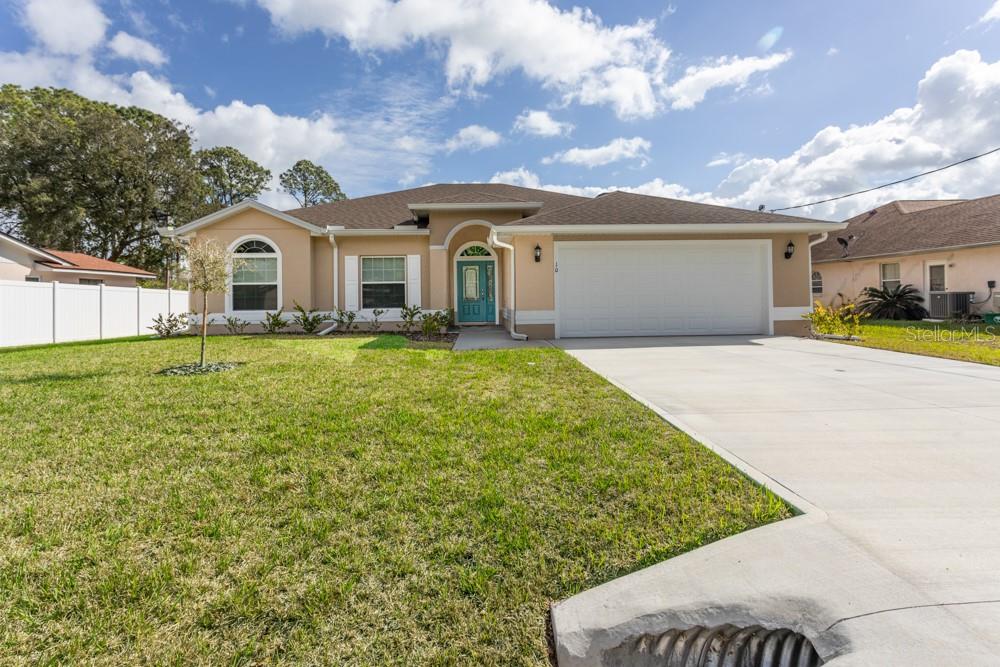 Single Family Residence in PALM COAST, FL - Daniel Dourado