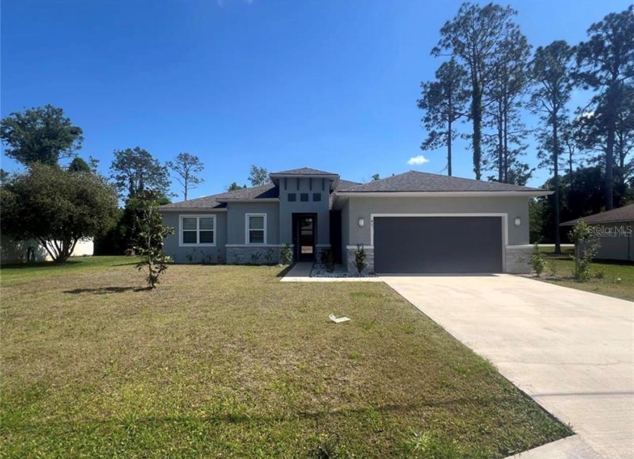Single Family Residence in PALM COAST, FL - Daniel Dourado