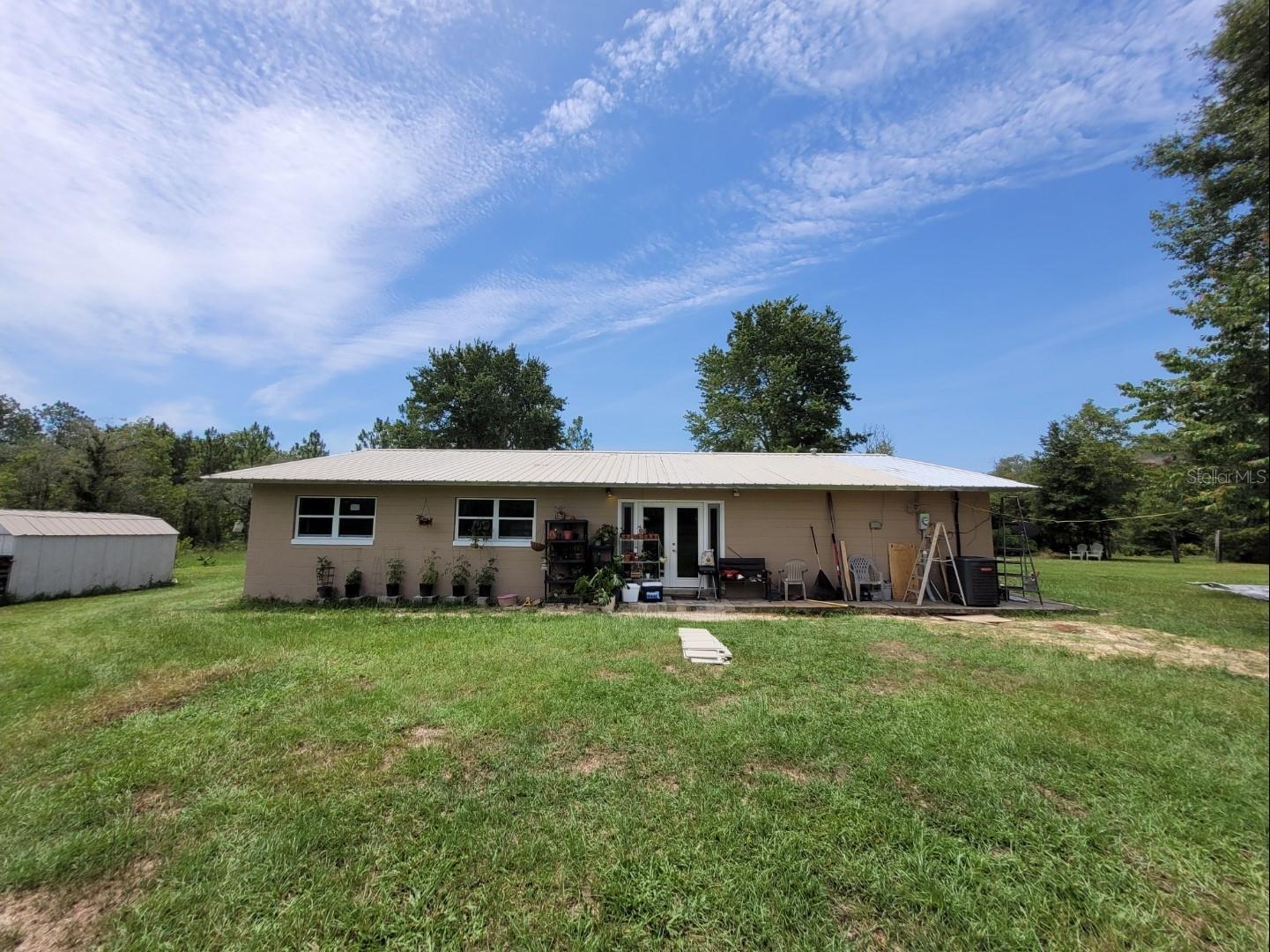 Single Family Residence em ARCHER, FL - Daniel Dourado