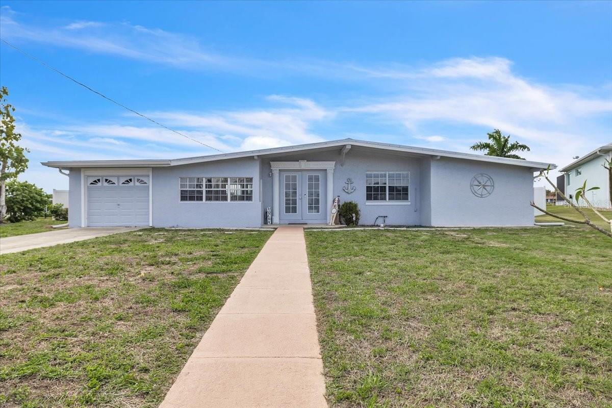 Single Family Residence in PORT CHARLOTTE, FL - Daniel Dourado