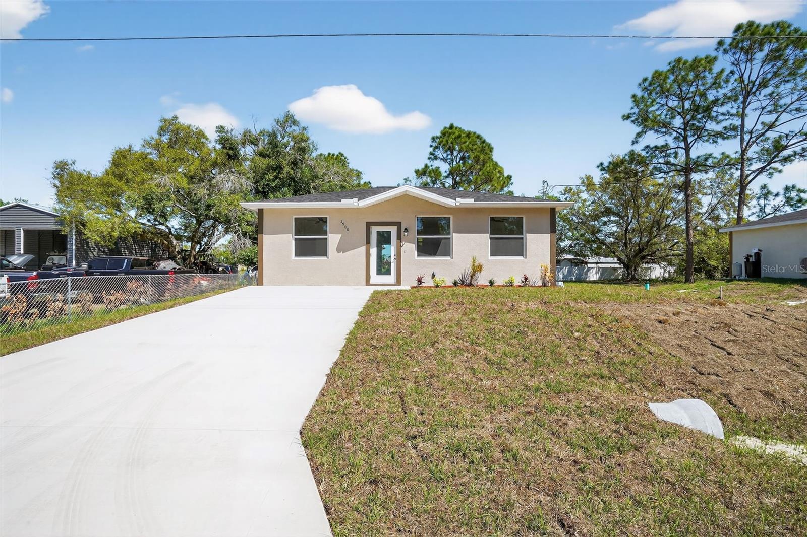 Single Family Residence in LEHIGH ACRES, FL - Daniel Dourado