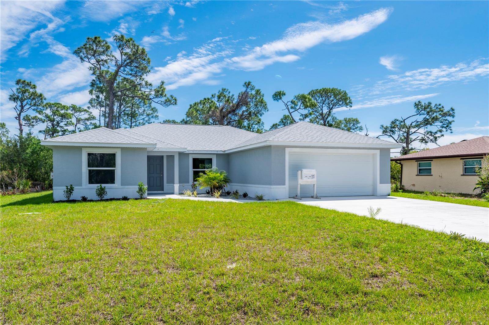 Single Family Residence em PUNTA GORDA, FL - Daniel Dourado