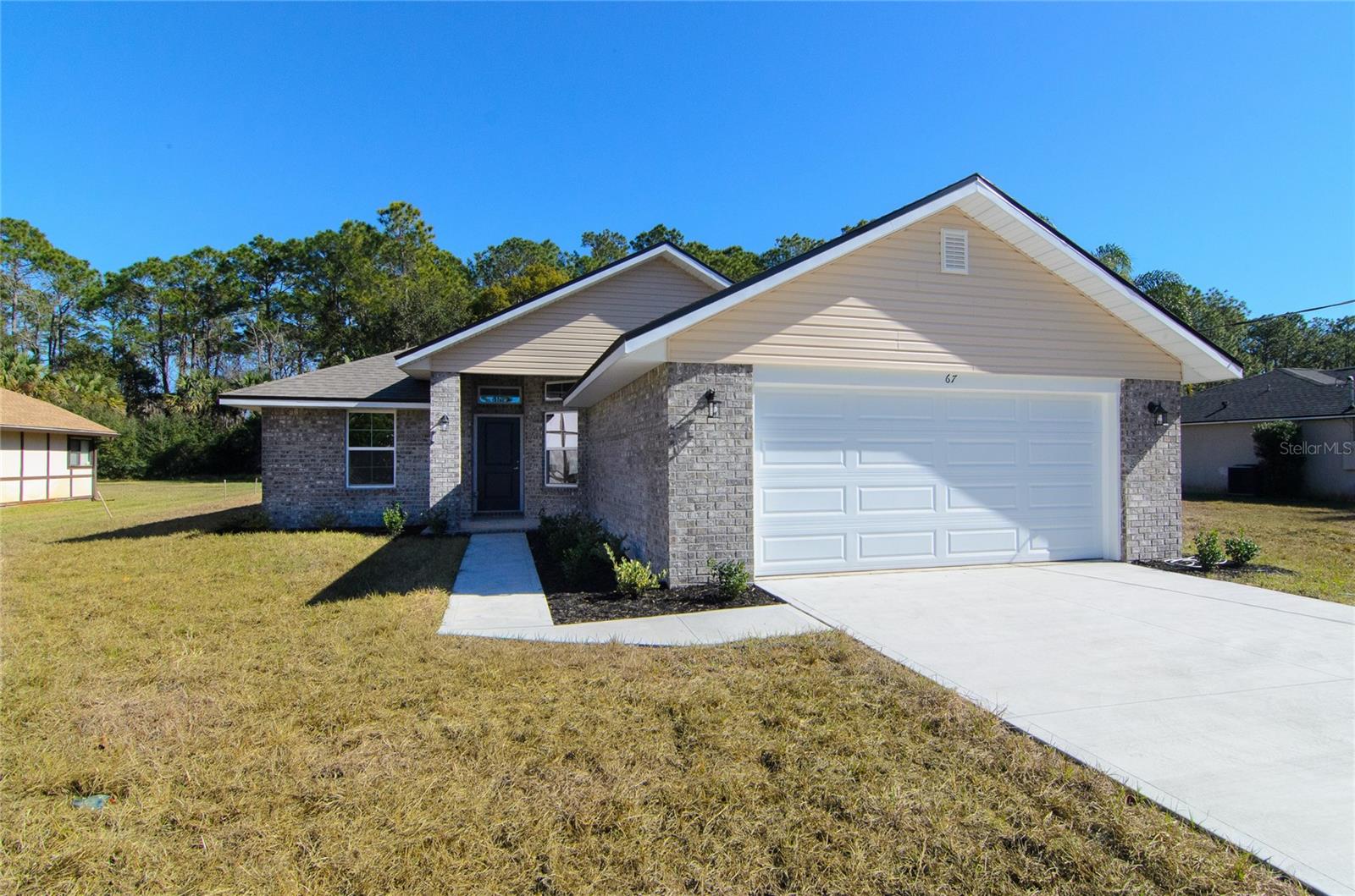 Single Family Residence in PALM COAST, FL - Daniel Dourado