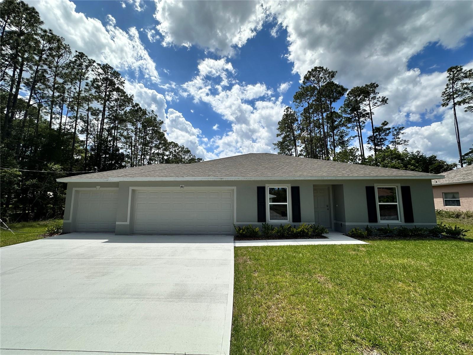Single Family Residence in PALM COAST, FL - Daniel Dourado
