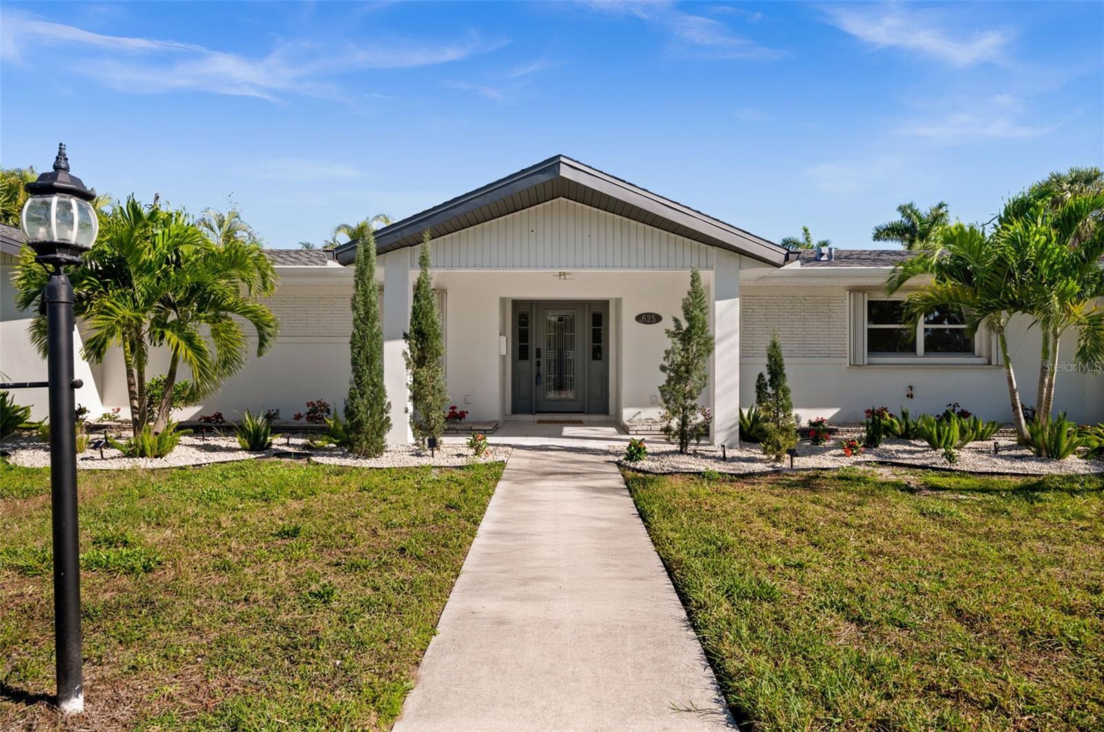 Single Family Residence em PUNTA GORDA, FL - Daniel Dourado