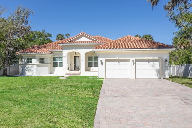 Single Family Residence em FLAGLER BEACH, FL - Daniel Dourado