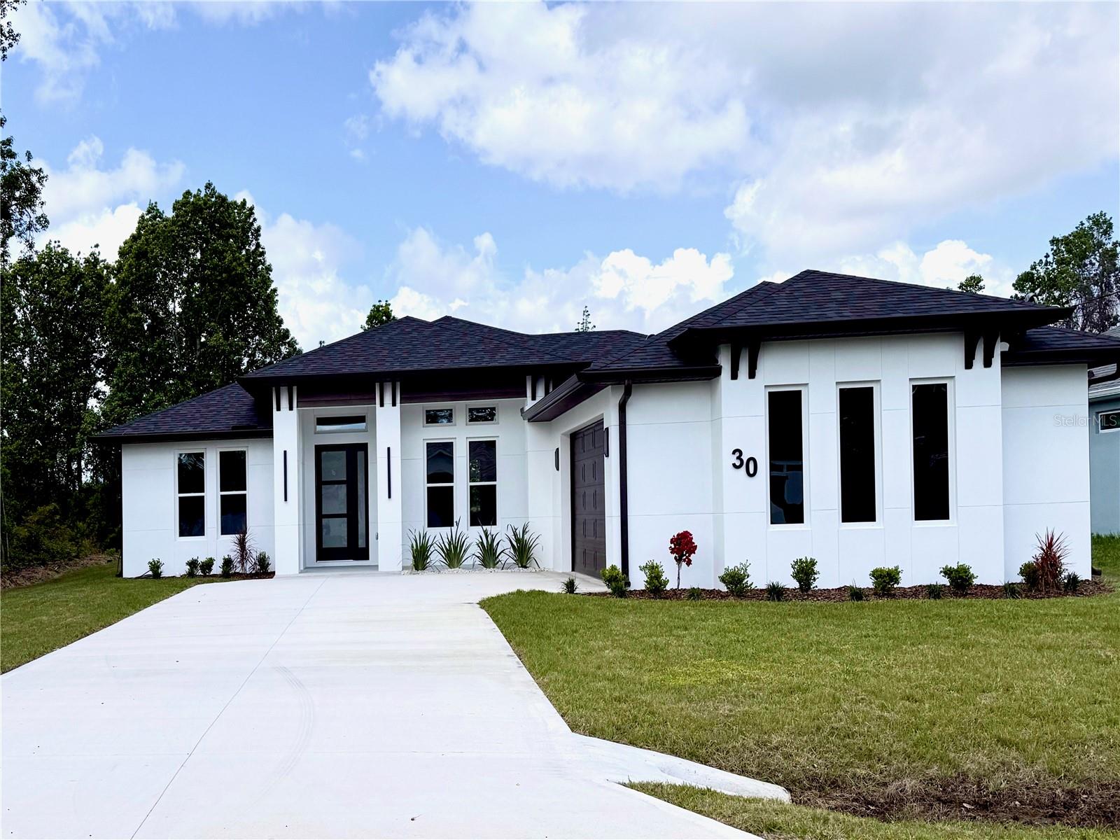 Single Family Residence in PALM COAST, FL - Daniel Dourado