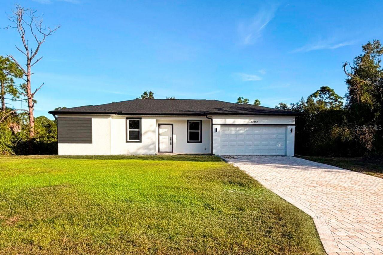 Single Family Residence in PUNTA GORDA, FL - Daniel Dourado