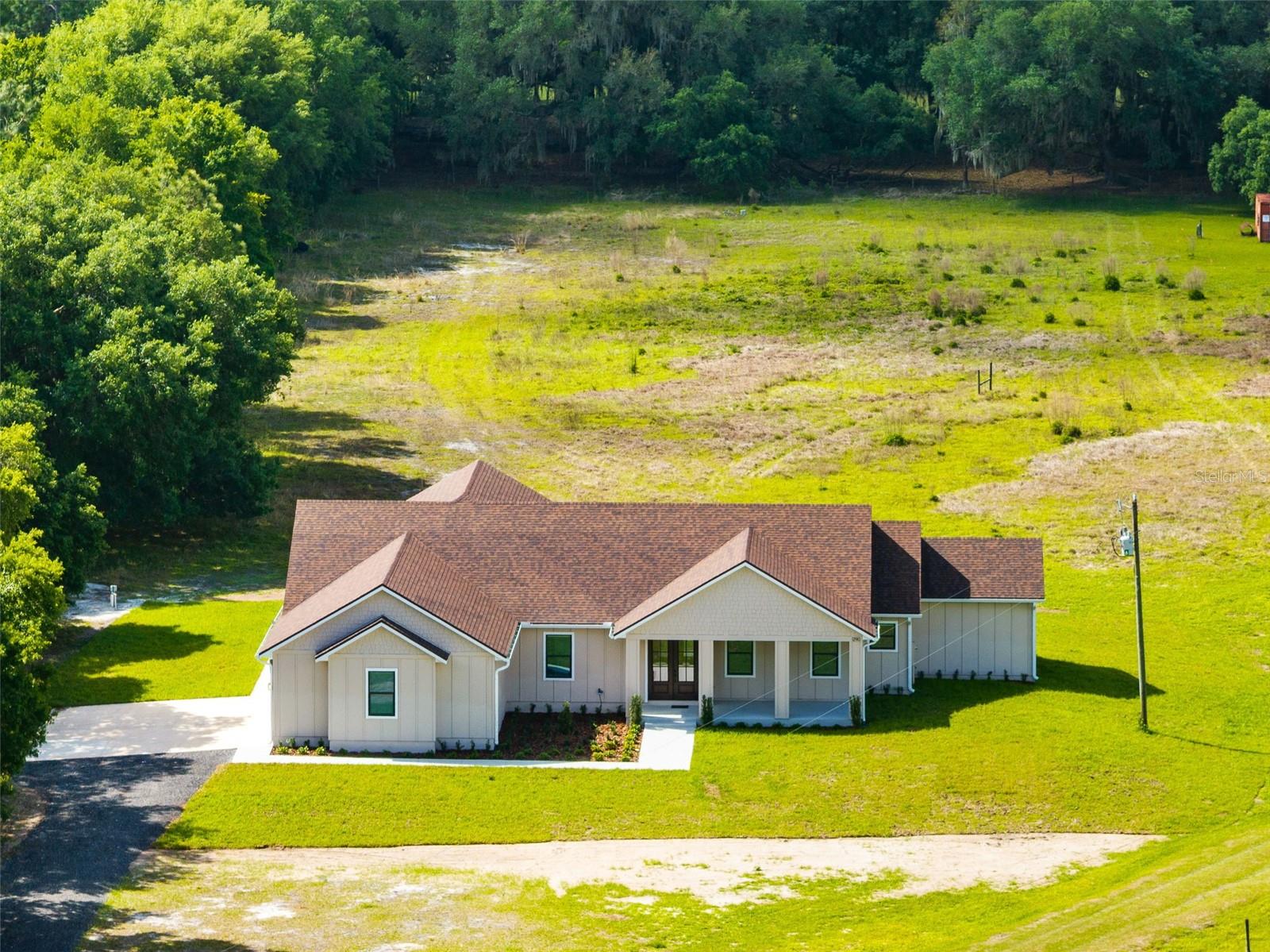 Single Family Residence in KENANSVILLE, FL - Daniel Dourado