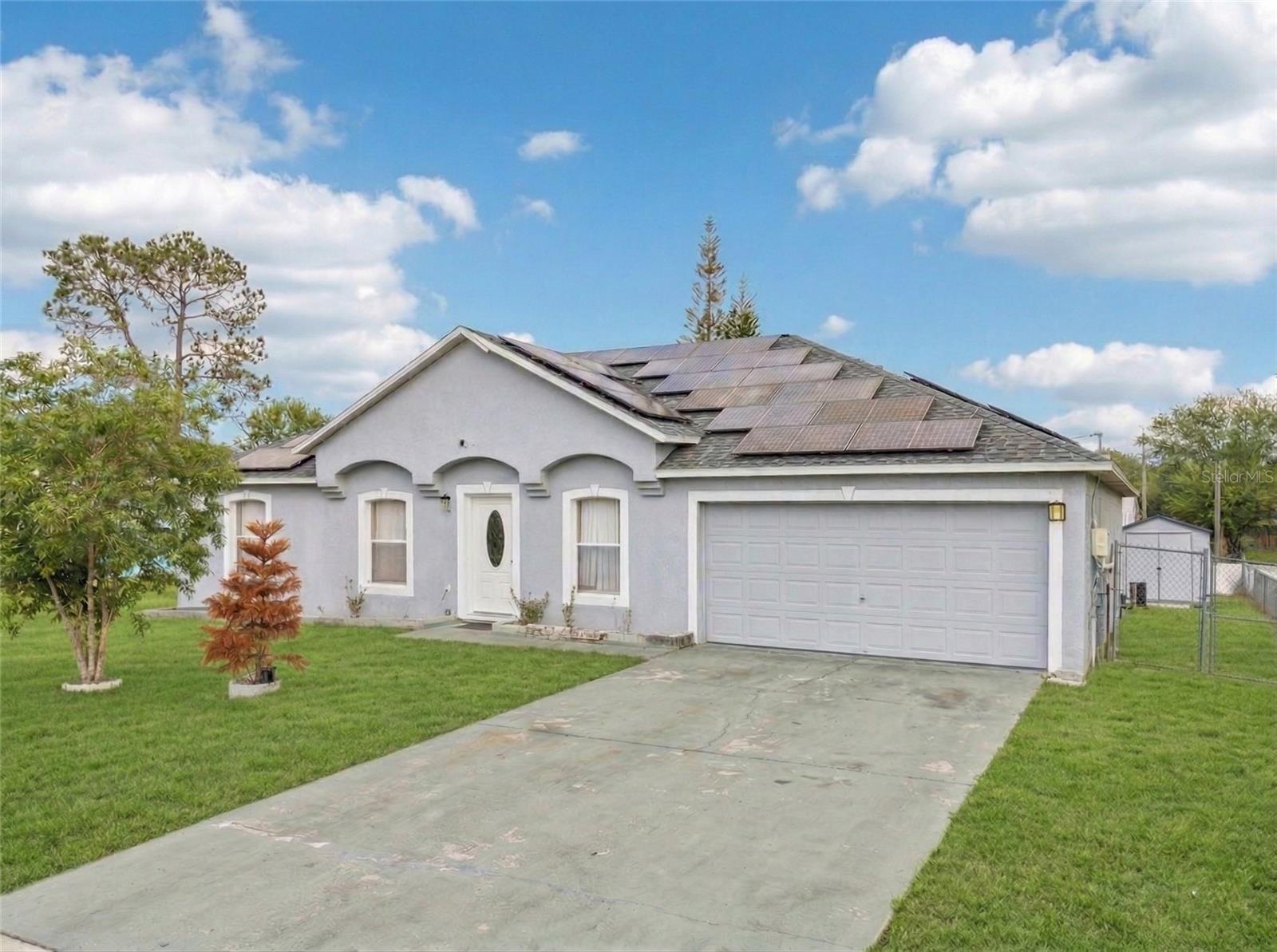 Single Family Residence em POINCIANA, FL - Daniel Dourado
