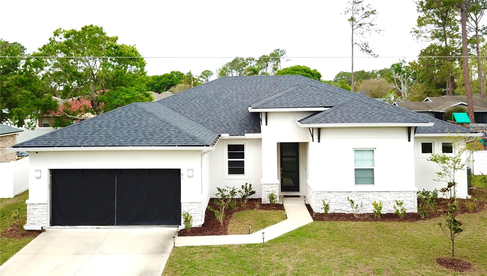 Single Family Residence in PALM COAST, FL - Daniel Dourado